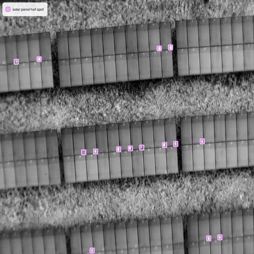 Benchmark sample: Aerial / Drone (Solar Hot Spots) with predicted boxes and labels