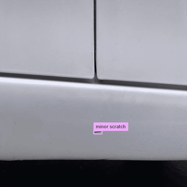Benchmark sample: Automotive (Damage Detection) with predicted boxes and labels